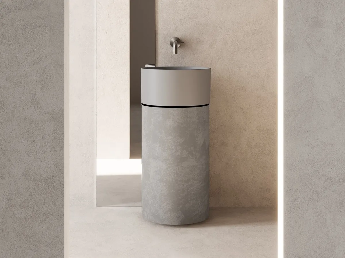 Core-Freestanding-Waschplatz mit grauem Becken und zylindrischem Unterschrank in Betonoptik