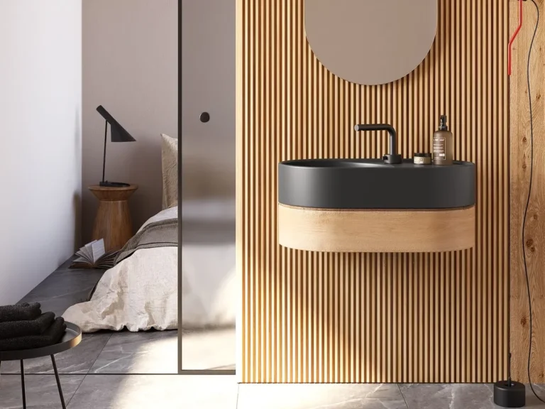 Galassia T65: dunkles ovales Becken mit Holzschublade vor einer Wand aus senkrechten Holzleisten