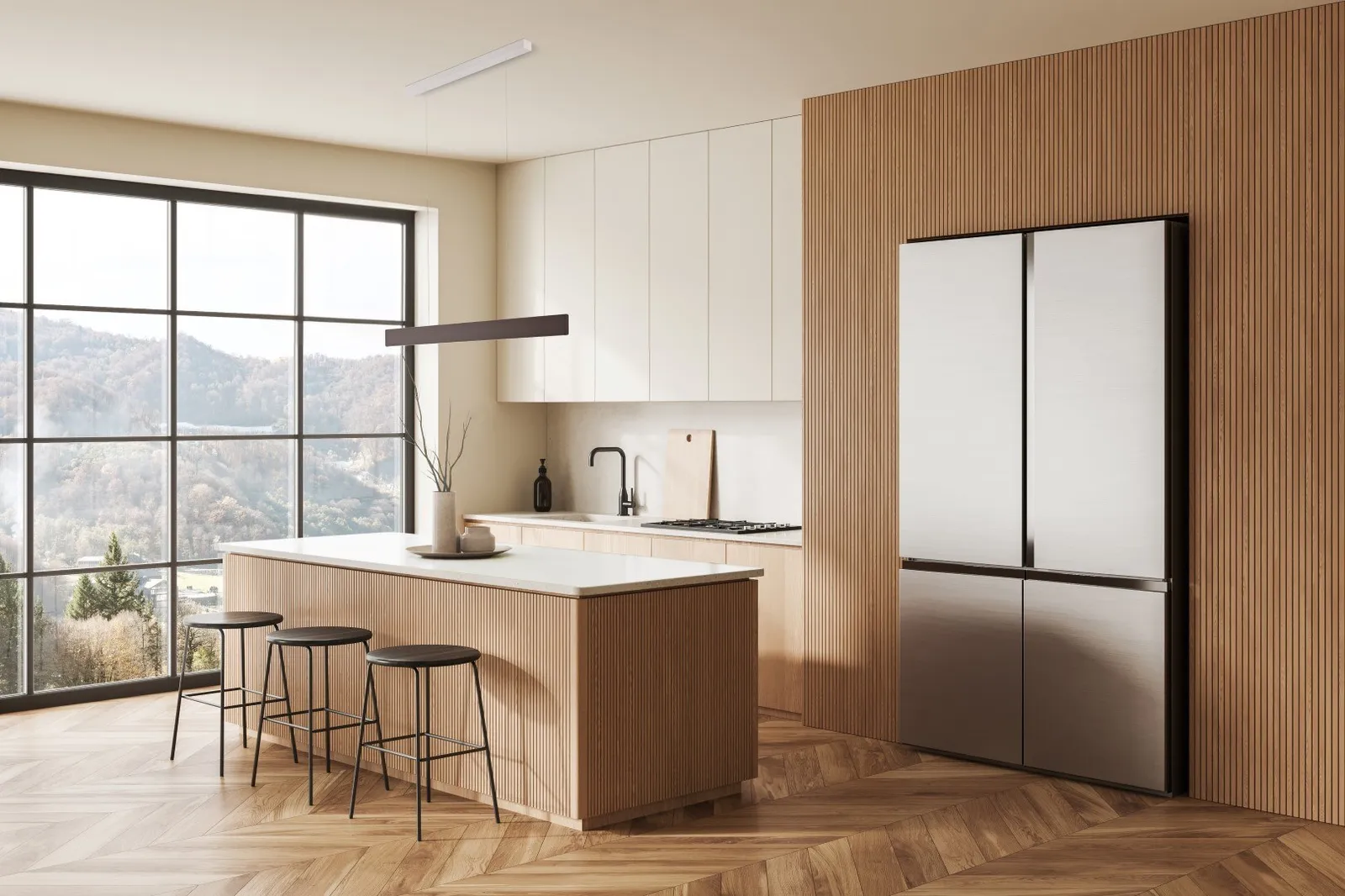 Molto Luce After8: Pendelleuchten über einer hellen Kücheninsel mit Barhockern und geriffelten Holzfronten