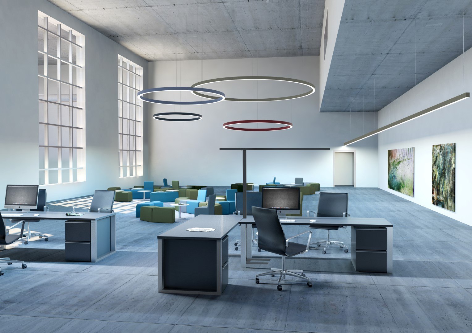 Molto Luce LOG 50: Ring- und Linienleuchten über Arbeitsplätzen und einer Sitzgruppe in einem offenen Büro